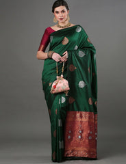 Exquisite Dark Green Banarasi Soft Silk Saree with Copper & Silver Zari Weaving