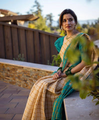 Elegant Off-White and Teal-Blue Banarasi Soft Silk Saree with Gold Zari Weaving