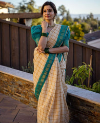 Elegant Off-White and Teal-Blue Banarasi Soft Silk Saree with Gold Zari Weaving