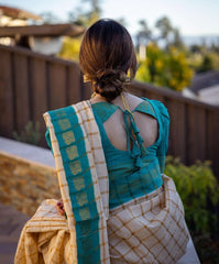 Elegant Off-White and Teal-Blue Banarasi Soft Silk Saree with Gold Zari Weaving