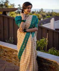 Elegant Off-White and Teal-Blue Banarasi Soft Silk Saree with Gold Zari Weaving