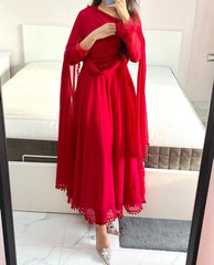 Red Heavy Georgette Gown with Pom Pom Work, Potli Buttons and Chudidar Sleeves