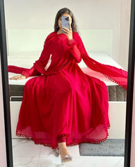 Red Heavy Georgette Gown with Pom Pom Work, Potli Buttons and Chudidar Sleeves