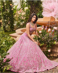 Rani Pink color Silk Lehenga Choli with Heavy Embroidery work