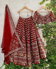 Maroon Colored Silk Lehenga Choli with Embroidery and Sequence Work